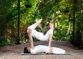 Acroyoga in the garden Royalty Free Stock Photo