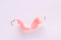 Acrylic denture with metal clasps for restoring dentition