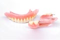 Acrylic dentures isolated on white background. Removable dentures flexible. False teeth Royalty Free Stock Photo