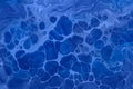 Acrylic Fluid Art. Blue sapphire waves and and spot drops. Abstract aqua background or texture