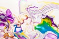 Acrylic paint waves abstract background. Rainbow marble texture. Oil paint liquid flow colorful wallpaper. Creative