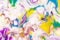 Acrylic paint waves abstract background. Rainbow marble texture. Oil paint liquid flow colorful wallpaper. Creative