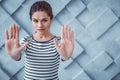 Dissent dark-haired woman pushing her hands forward Royalty Free Stock Photo