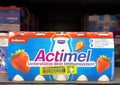 Actimel strawberry yogurt drink packaging on store shelf with german label Royalty Free Stock Photo