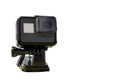Action camera in mount stand clipping clamp on table Royalty Free Stock Photo