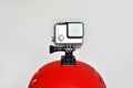 Action camera on red sport helmet Royalty Free Stock Photo