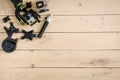 Action camera on the wooden table with a stabilizer Royalty Free Stock Photo