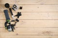 Action camera on the wooden table with a stabilizer Royalty Free Stock Photo
