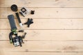 Action camera on the wooden table with a stabilizer Royalty Free Stock Photo