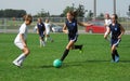 A young soccer player displays her ball control. Royalty Free Stock Photo