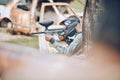 Action, paintball and target with man in field for sports, fitness and shooting games. War, soldier and adventure with