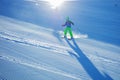 Action photo of a boy ski downhill fast on the fresh track Royalty Free Stock Photo