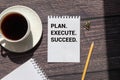 Action Plan Plan, Execute, Succed writing on notebook Royalty Free Stock Photo