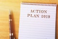 Action plan 2019 text on notepad