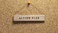 The action plan was written on a wooden surface. Wooden concept. Work and education, personal development Royalty Free Stock Photo