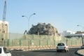 Action shot of a building undergoing demolition Doha, Qatar Royalty Free Stock Photo