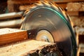 action shot of a circular saw held at an angle, slicing through timber Royalty Free Stock Photo