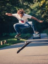 Action shot of a skateboarder skating, doing tricks and jumping Royalty Free Stock Photo