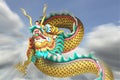 Action zoom blurring china dragon statue flying in the sky.