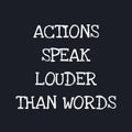 Actions speak louder than words - Motivational quote on dark background