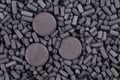 Activated carbon granules and tablets Royalty Free Stock Photo