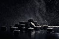 Activated carbon tablets on a black background with a side. The concept of cleansing the body. Pharmaceutical background Royalty Free Stock Photo