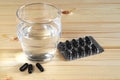 Activated charcoal and water Royalty Free Stock Photo