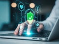 Activating cybersecurity shield on laptop Royalty Free Stock Photo