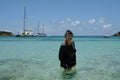 Active Senior Woman Standing in Tropical Bay