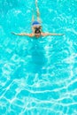 Active athlete swims in pool