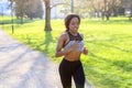 Active athletic young woman out jogging