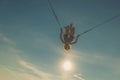 Active child in bungee jumping trampoline at sunset Royalty Free Stock Photo