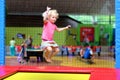 Active child jumping on the trampoline Royalty Free Stock Photo