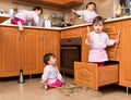 Active child playing in the kitchen Royalty Free Stock Photo