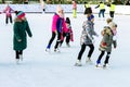 Active children`s rest with a joyful mood at the city rink