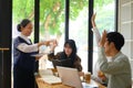 Active college students raising hands to answer teacher& x27;s question during class Royalty Free Stock Photo