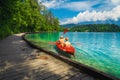 Active couple canoeing and enjoying the view, lake Bled, Slovenia Royalty Free Stock Photo