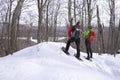 Active Couple on Snowshoes