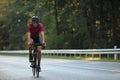 Active cyclist riding bike on paved road Royalty Free Stock Photo