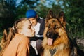 Active Family, fitness couple, Pet Love, Dog Training, best dog breeds for family. Young sports couple walking with two Royalty Free Stock Photo