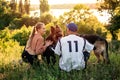 Active Family, fitness couple, Pet Love, Dog Training, best dog breeds for family. Young sports couple walking with two Royalty Free Stock Photo