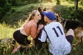 Active Family, fitness couple, Pet Love, Dog Training, best dog breeds for family. Young sports couple walking with two Royalty Free Stock Photo