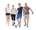 Active family playing soccer