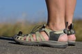 Active feet wearing sports beach sandals Royalty Free Stock Photo