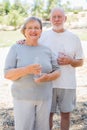 Active Happy Healthy Senior Couple with Water Bottles Royalty Free Stock Photo