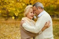 Active seniors on a walk in autumn forest Royalty Free Stock Photo