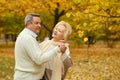 Active seniors on a walk in autumn forest Royalty Free Stock Photo