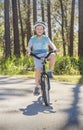 Active, Healthy Boy riding his bike outdoors on a sunny day Royalty Free Stock Photo