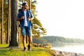 Active healthy man hiking in beautiful forest