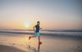 Active healthy runner jogging outdoor. Young and active jogger running. Fit male fitness runner during outdoor workout Royalty Free Stock Photo